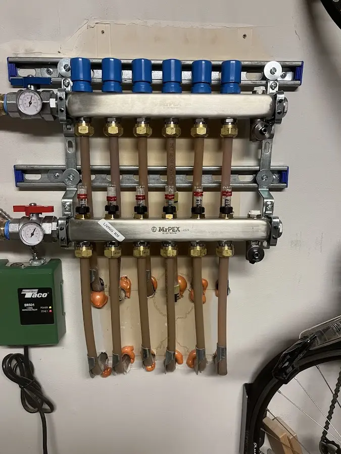 Plumber performing Water Heater Repair at a residential property in Gladstone